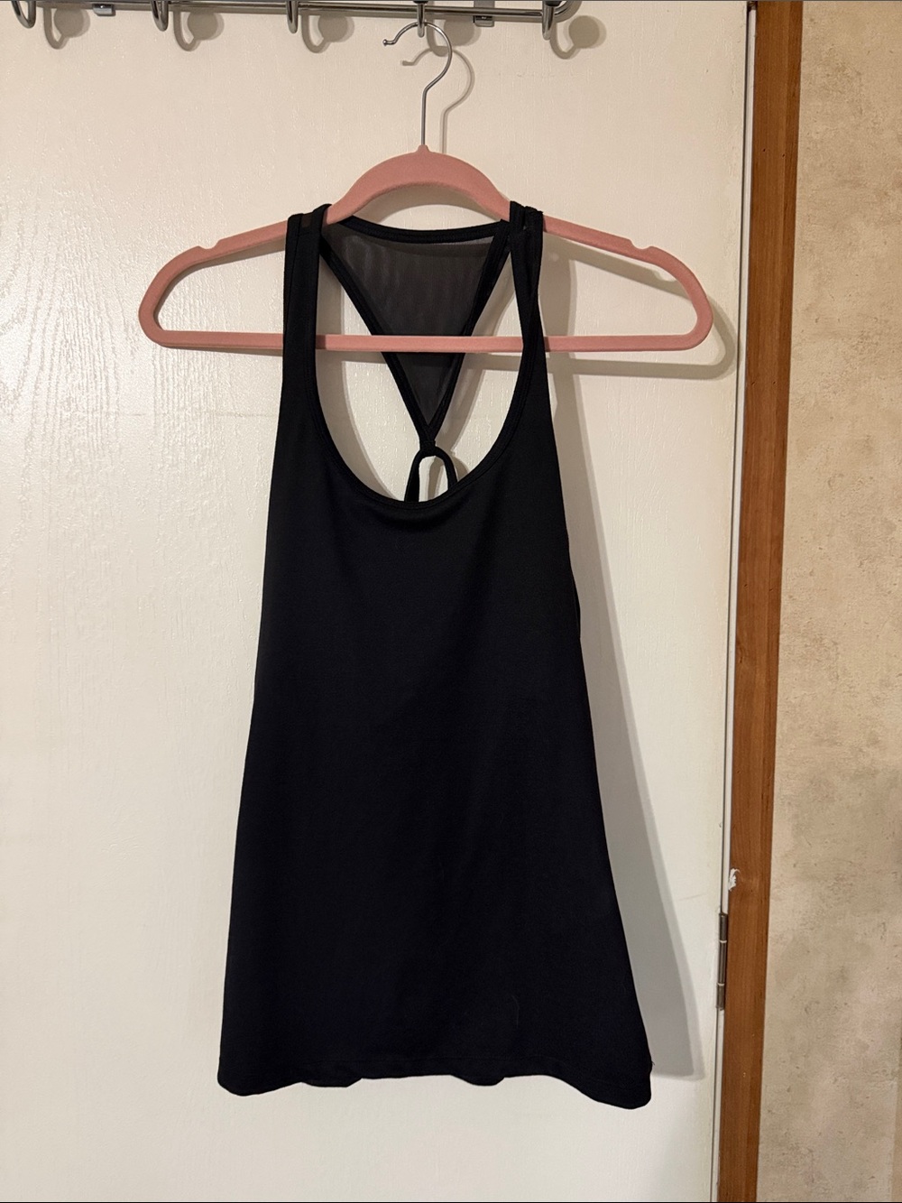 Studio Black Tank Top with Subtle Logo Tag